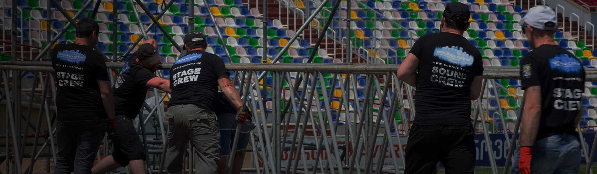 The Sound City stage crew building in a stadium